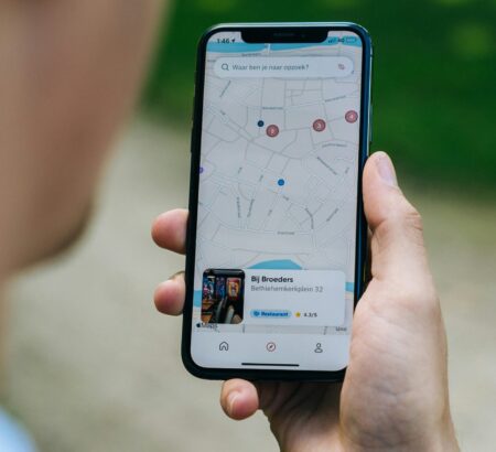 person holding white android smartphone